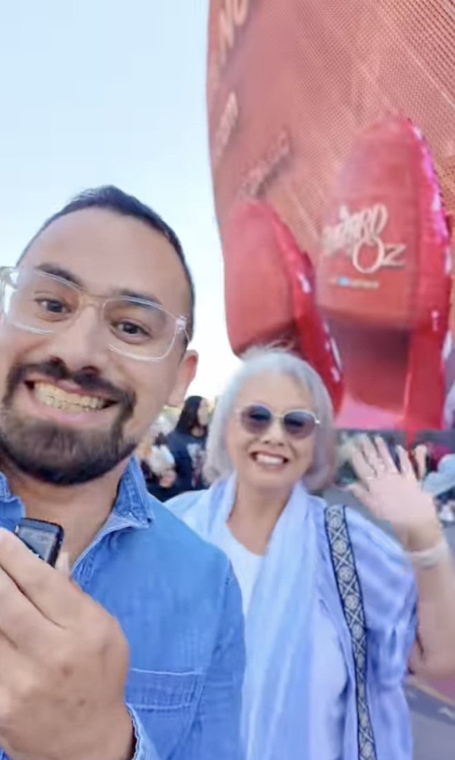 Selfie with mom in front of the Wicked Wizard of Oz balloon